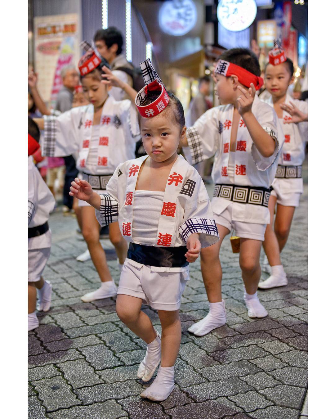 The expression on this mini #awaodori performer's face pretty much mirrored mine when I realised "it's already #Monday ?" As we get closer to the Awaodori season, I'll be posting a number of the images I took from last year so.. yeah.  Now excuse me, I think I hear some coffee calling my name.. #Japan #ItsMonday #Dance #Streetperformance